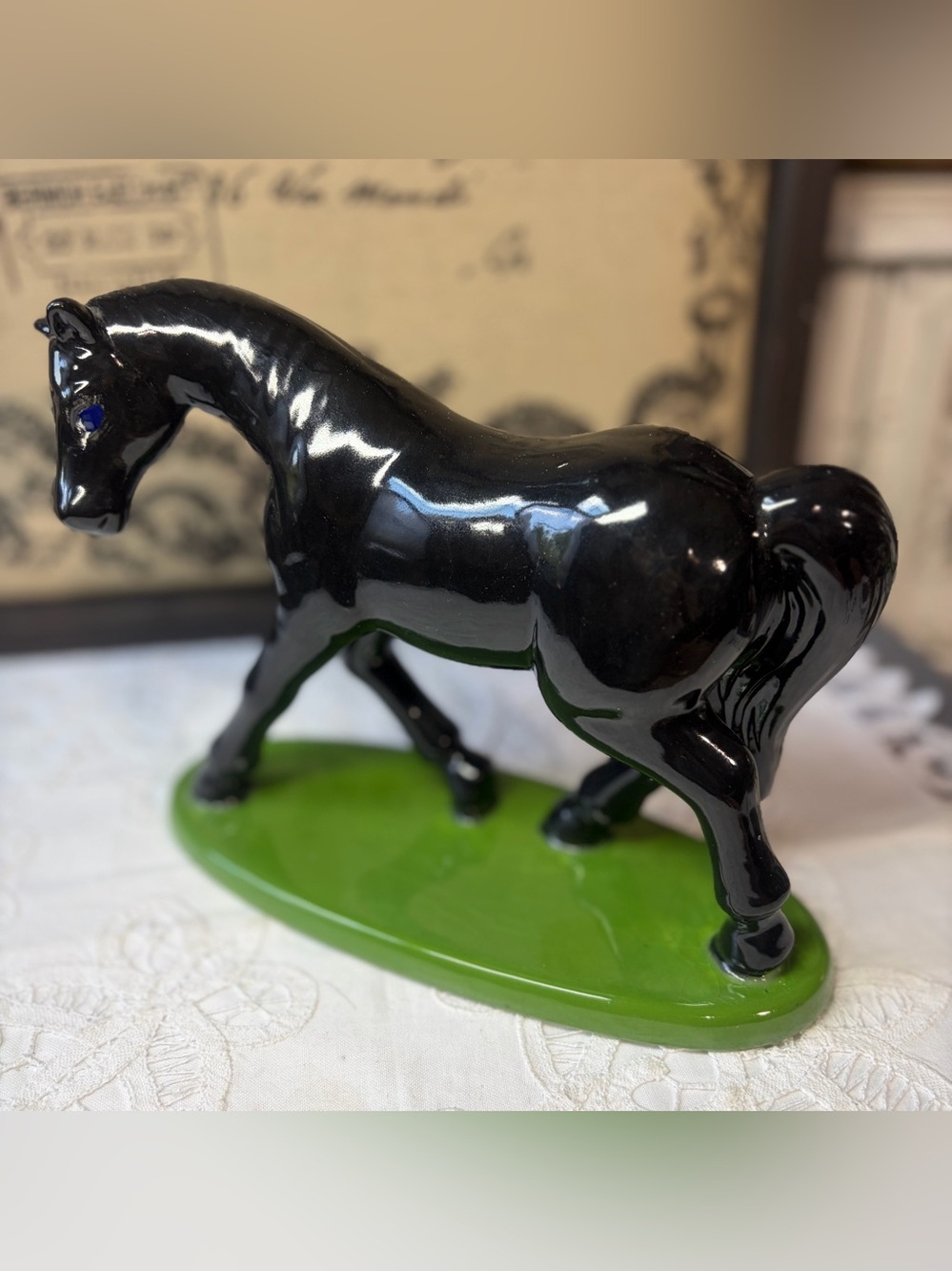Vintage black ceramic horse blue eyes figurine